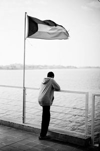 Full length rear view of woman in water