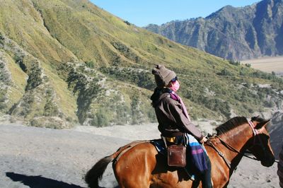 Man riding horse