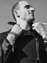 Portrait of young man looking away