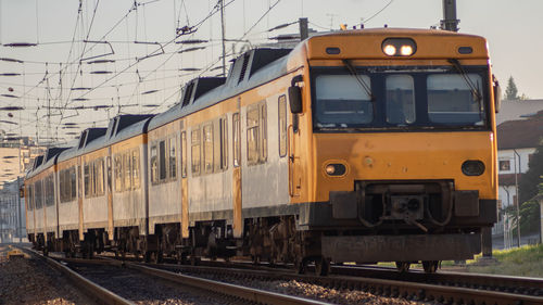 Train on railroad station platform against sky
