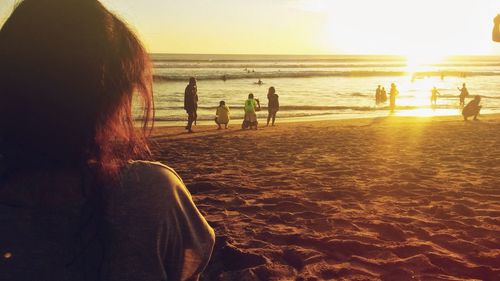 Silhouette of people at beach