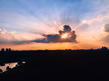 Scenic view of silhouette landscape against sky during sunset