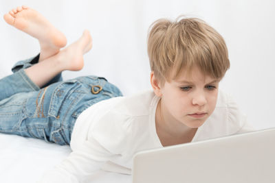 Boy using mobile phone