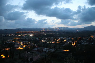 High angle view of illuminated buildings in city against sky