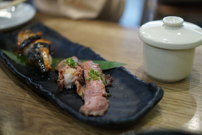 Close-up of meat in plate on table