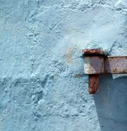 Close-up of old rusty metal door