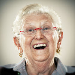 Portrait of an elderly lady, laughing out loud