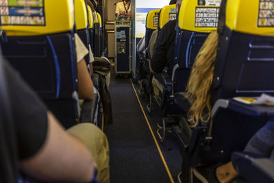 A file of seats in a plane with no recognizable people.