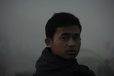 Portrait of man against sky during dusk