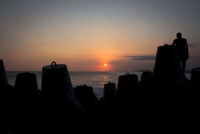 Scenic view of sea at sunset