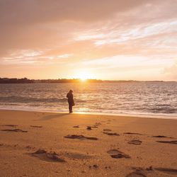Scenic view of sea at sunset