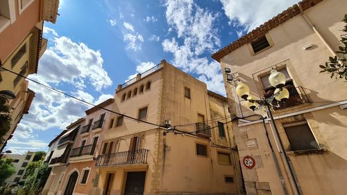 Low angle view of buildings against sky