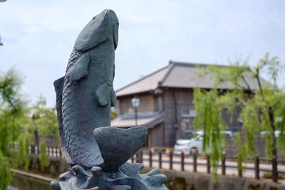 Close-up of statue against sky