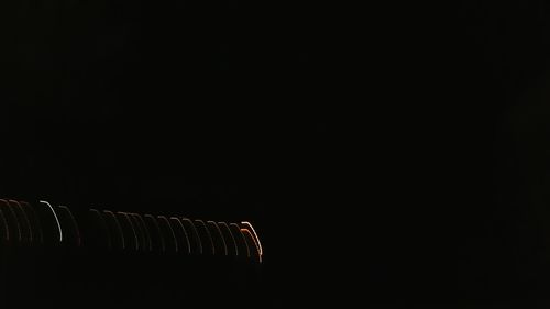 High section of lamp post against clear sky