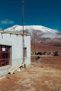 Abandoned built structure in mountain against sky