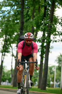 Portrait of woman riding bicycle