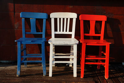 Empty colorful chairs arranged