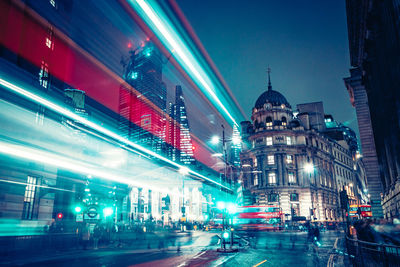 View of illuminated buildings in city at night