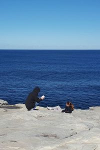 Scenic view of sea against clear sky