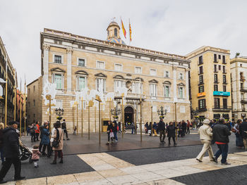 Group of people in front of building