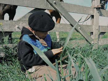 Boy holding umbrella