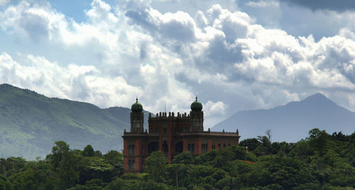 Castle against cloudy sky