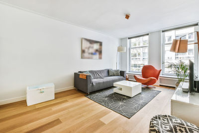 Table and chairs on hardwood floor at home