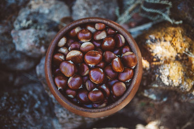 Close-up of chestnuts in container