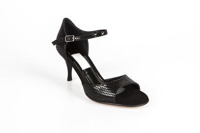 Close-up of shoes against white background