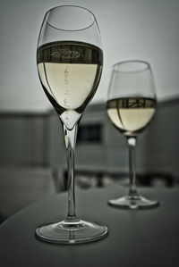 Close-up of wine in glass on table