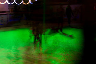 Person standing at night