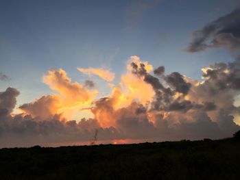 Scenic view of silhouette landscape against sky during sunset