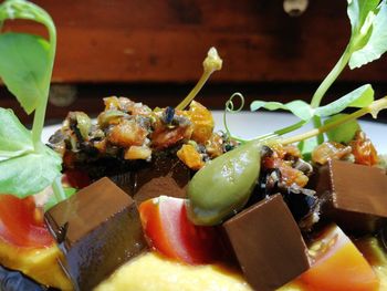 Close-up of chopped fruits in plate