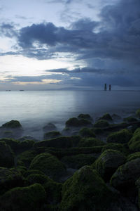 Scenic view of sea against sky at dusk. sanur, bali province, indonesia