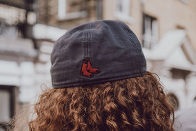 Rear view of woman wearing hat