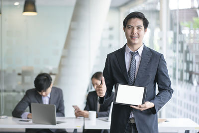 Portrait of man using mobile phone