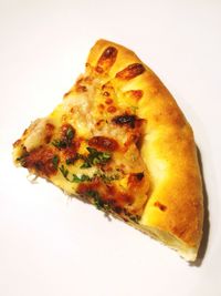 Close-up of served food against white background