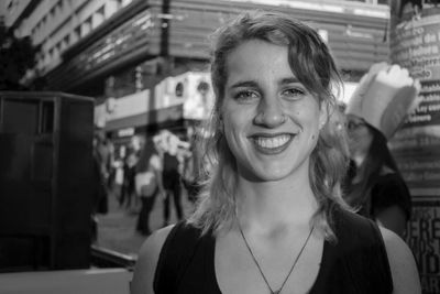 Close-up portrait of a smiling young woman