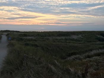 Scenic view of landscape against sky during sunset