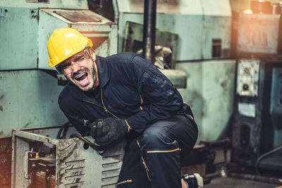 Rear view of man working