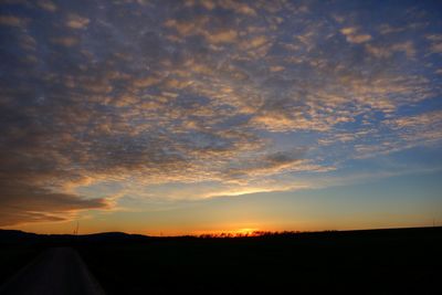 Scenic view of silhouette landscape against sky during sunset