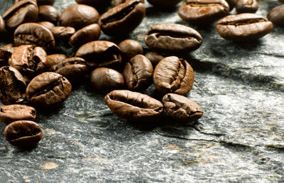 Close-up of coffee beans on table