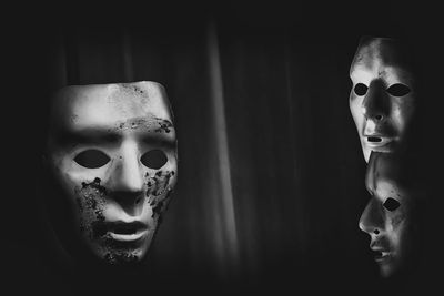 Close-up of masks in darkroom