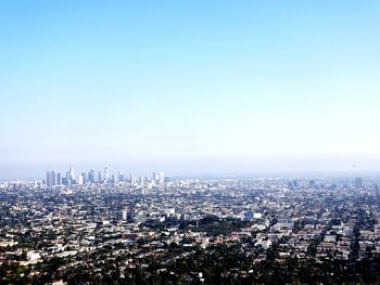 High angle view of buildings against clear sky
