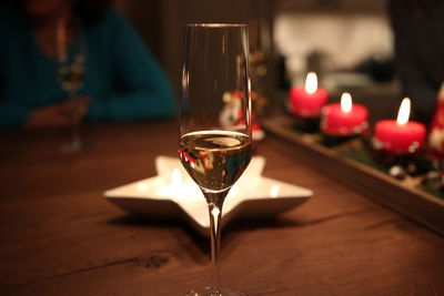 Close-up of wineglass on table