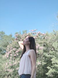 Smiling woman outside on a summer day