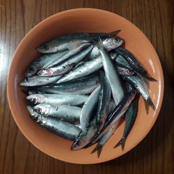 High angle view of fish in plate on table