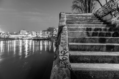 Staircase by building against sky