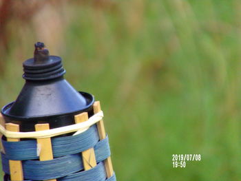 Close-up of drink in glass bottle