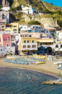 View of beach with houses in background